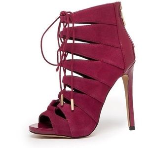 Bebe "Tillan" lace up booties